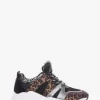 Chunky sneaker fondo gomma e soletto interno in vera pelle. Tomaia in tessuto con riporti in pelle leopard leopardo