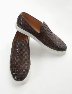 slip on fondo gomma e soletto interno in vera pelle. Tomaia in morbidissima pelle intrecciata tortora