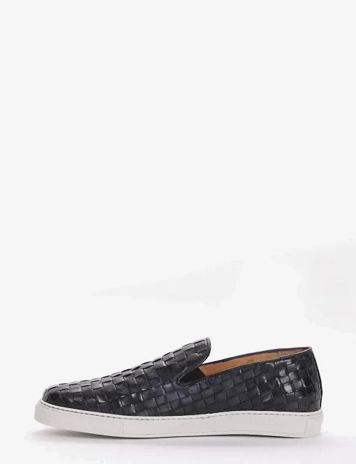 slip on fondo gomma e soletto interno in vera pelle. Tomaia in morbidissima pelle intrecciata blu