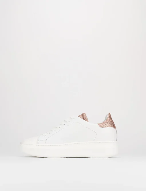 sneakers fondo gomma e soletto interno in vera pelle. Tomaia in morbida pelle bianco