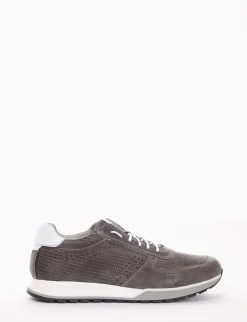 sneakers fondo in gomma e soletto interno in vera pelle. Tomaia in morbidissima pelle intrecciata con particolarissima suola ammortizzata grigio