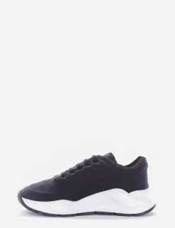 sneakers fondo in gomma e soletto interno in vera pelle. Tomaia in bellissimo tessuto in lycra nero