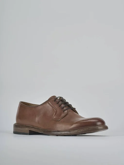 Stringate pelle testa